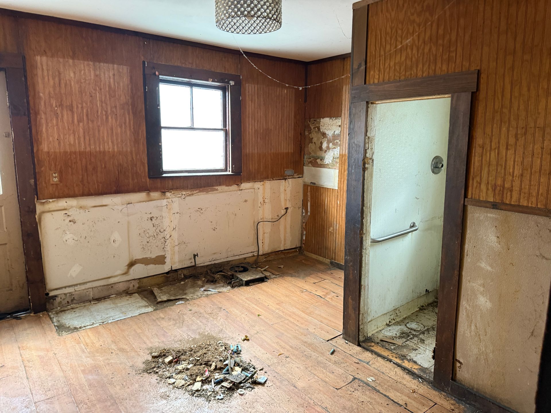 Room and a doorway to a shower.