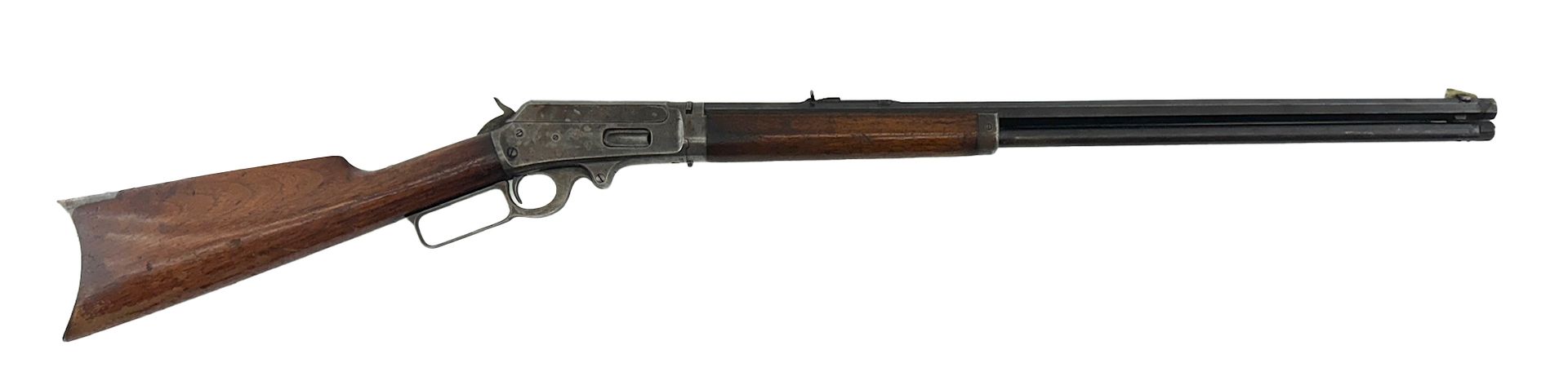 Lever-action rifle, wood and metal construction, side profile, against white background.