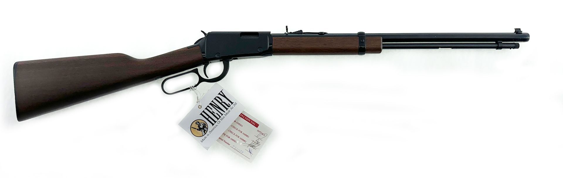 Lever action rifle with a brown stock and forend, black receiver and barrel, and a price tag.