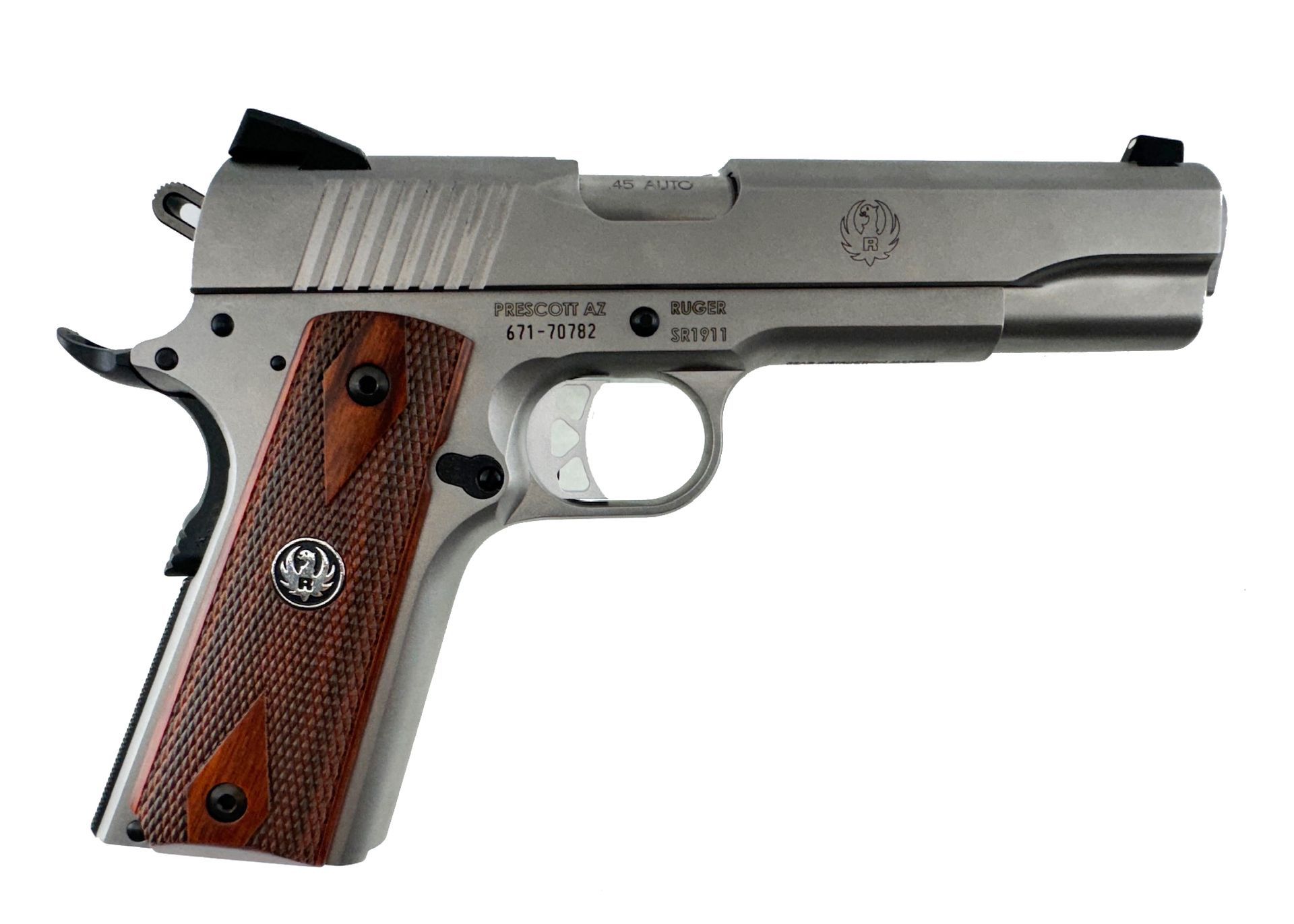 Silver handgun with brown wooden grip.
