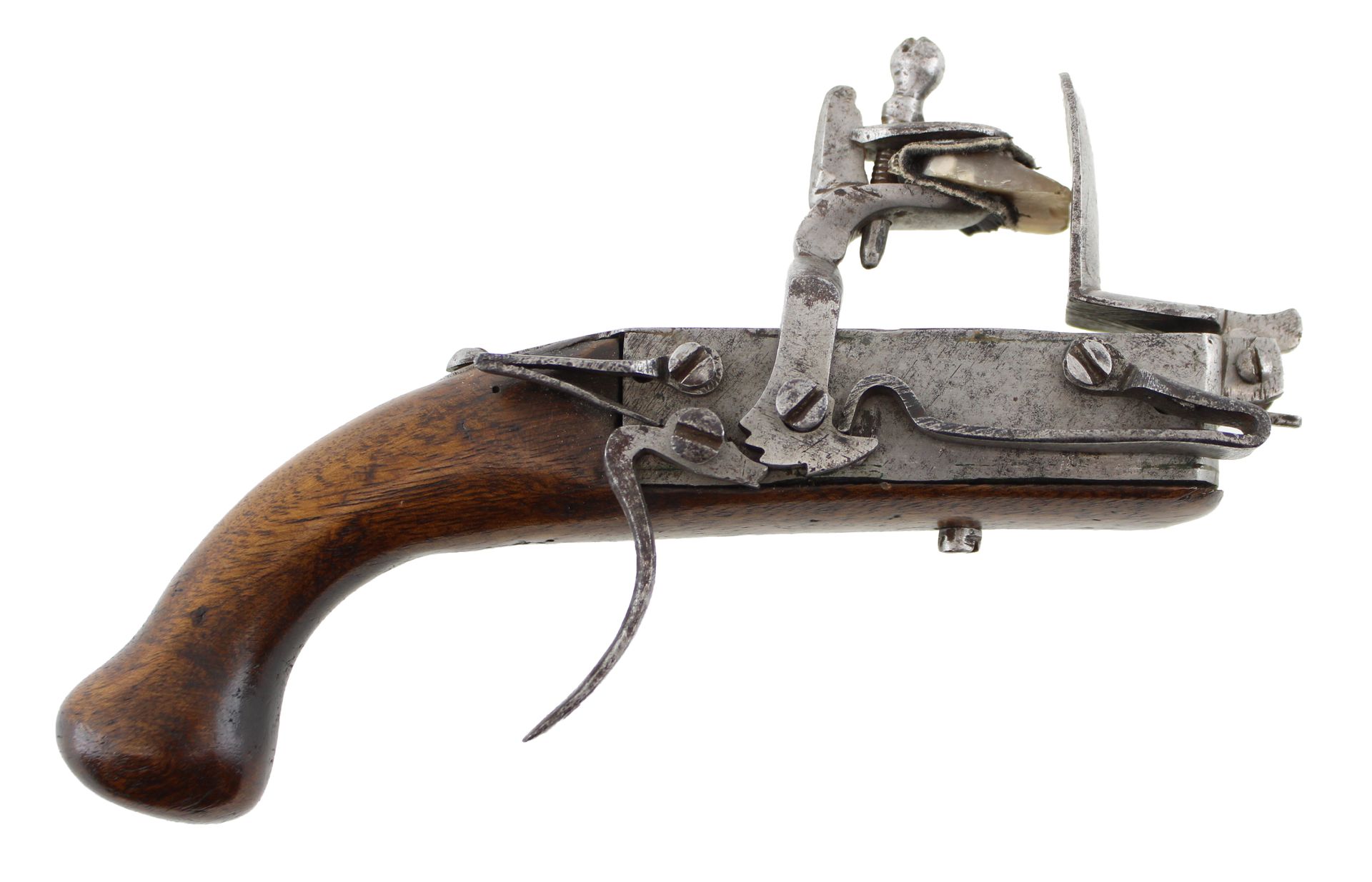 Antique flintlock pistol with wooden grip and exposed metal mechanism on a white background