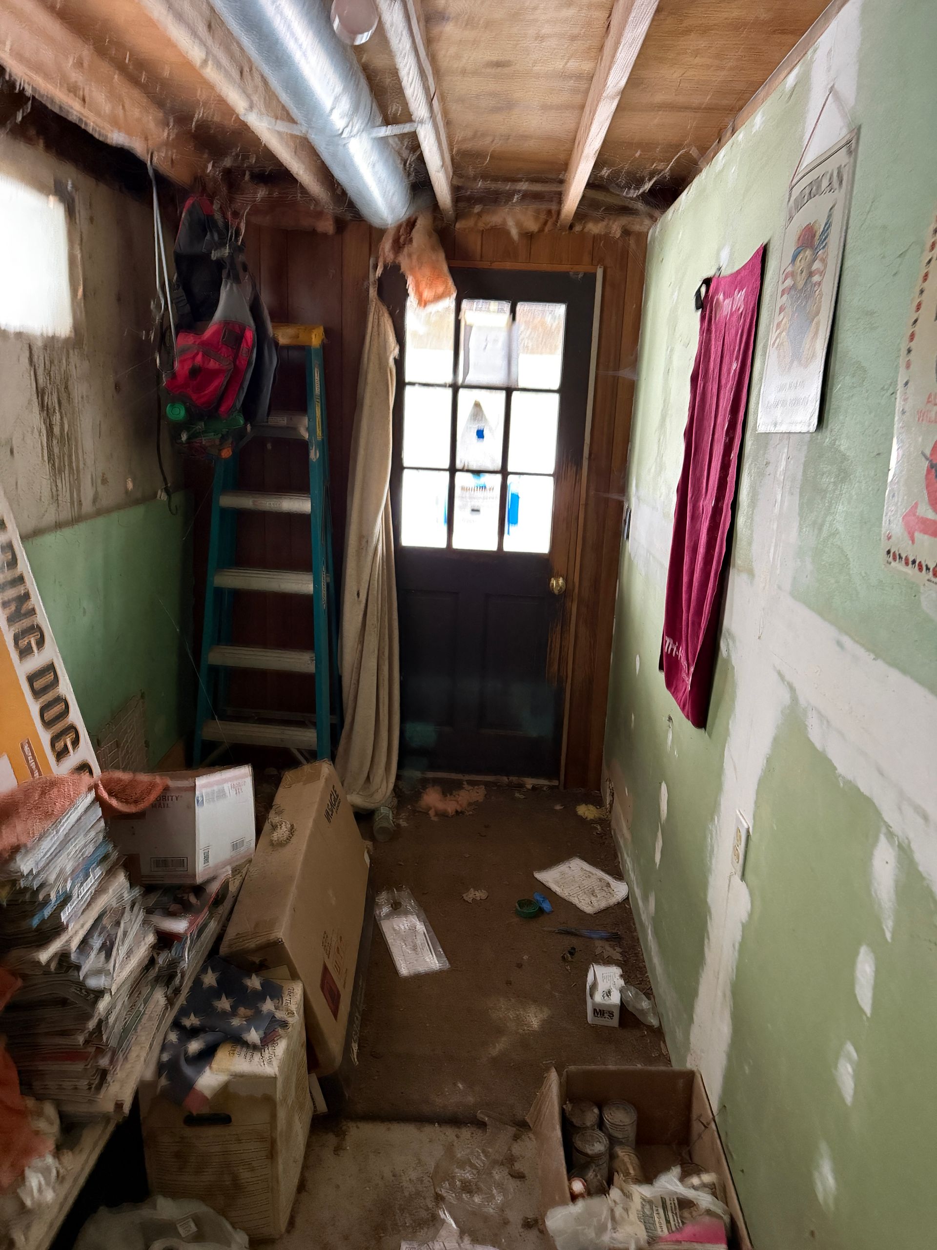 Entryway with door at end.