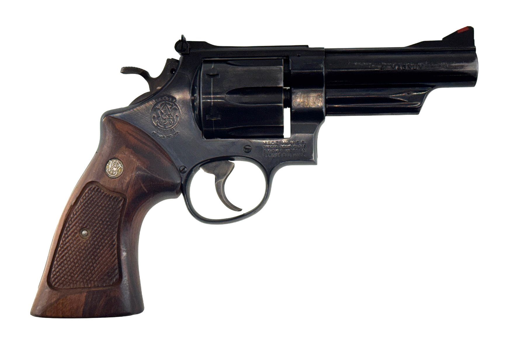 A black Smith & Wesson revolver with wooden grips, isolated on a white background.