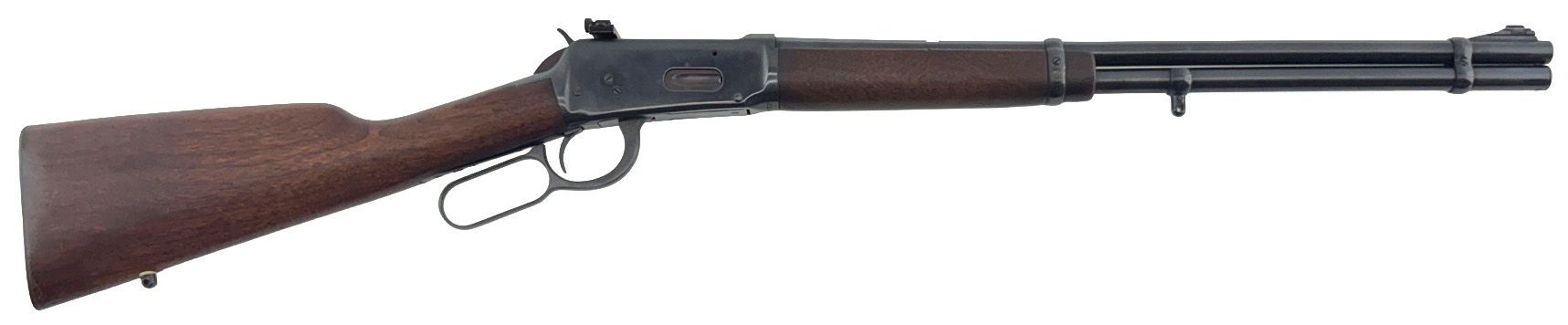 A lever-action rifle, likely a Winchester. It has a wooden stock and blued steel barrel and receiver.