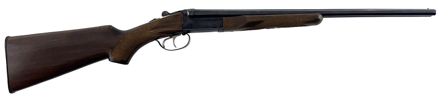 Side view of a double-barreled shotgun, with a wooden stock and blued steel barrels.