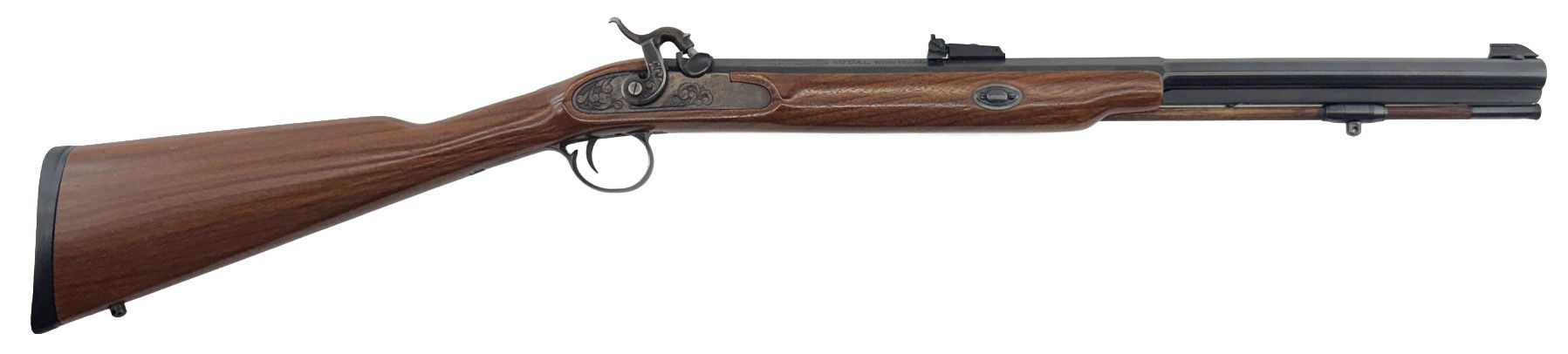Brown and black antique rifle.