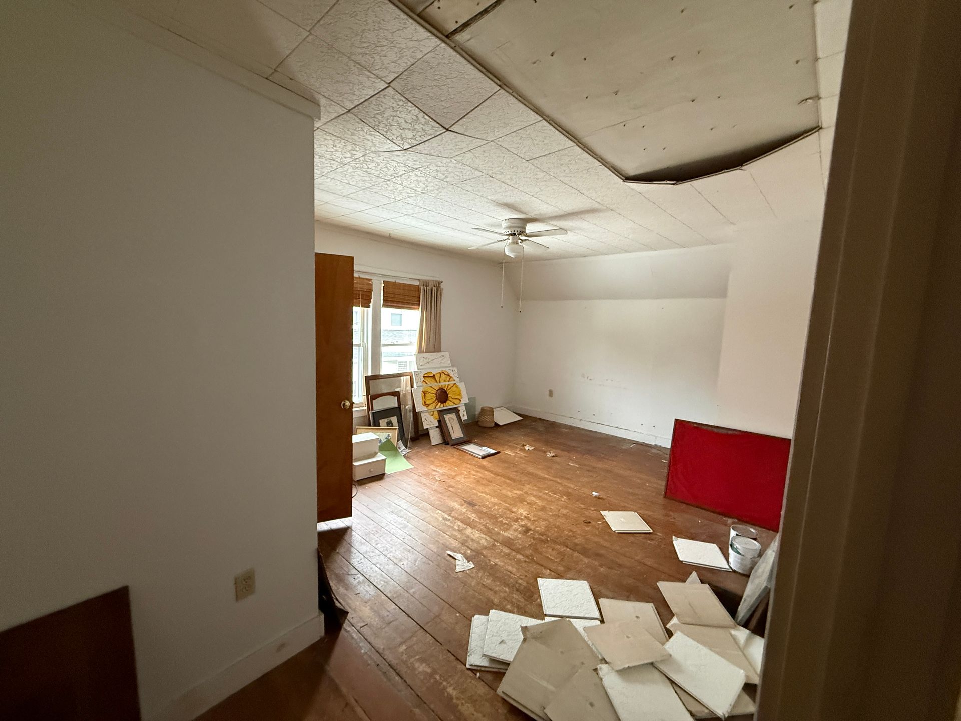A room with wooden floors.