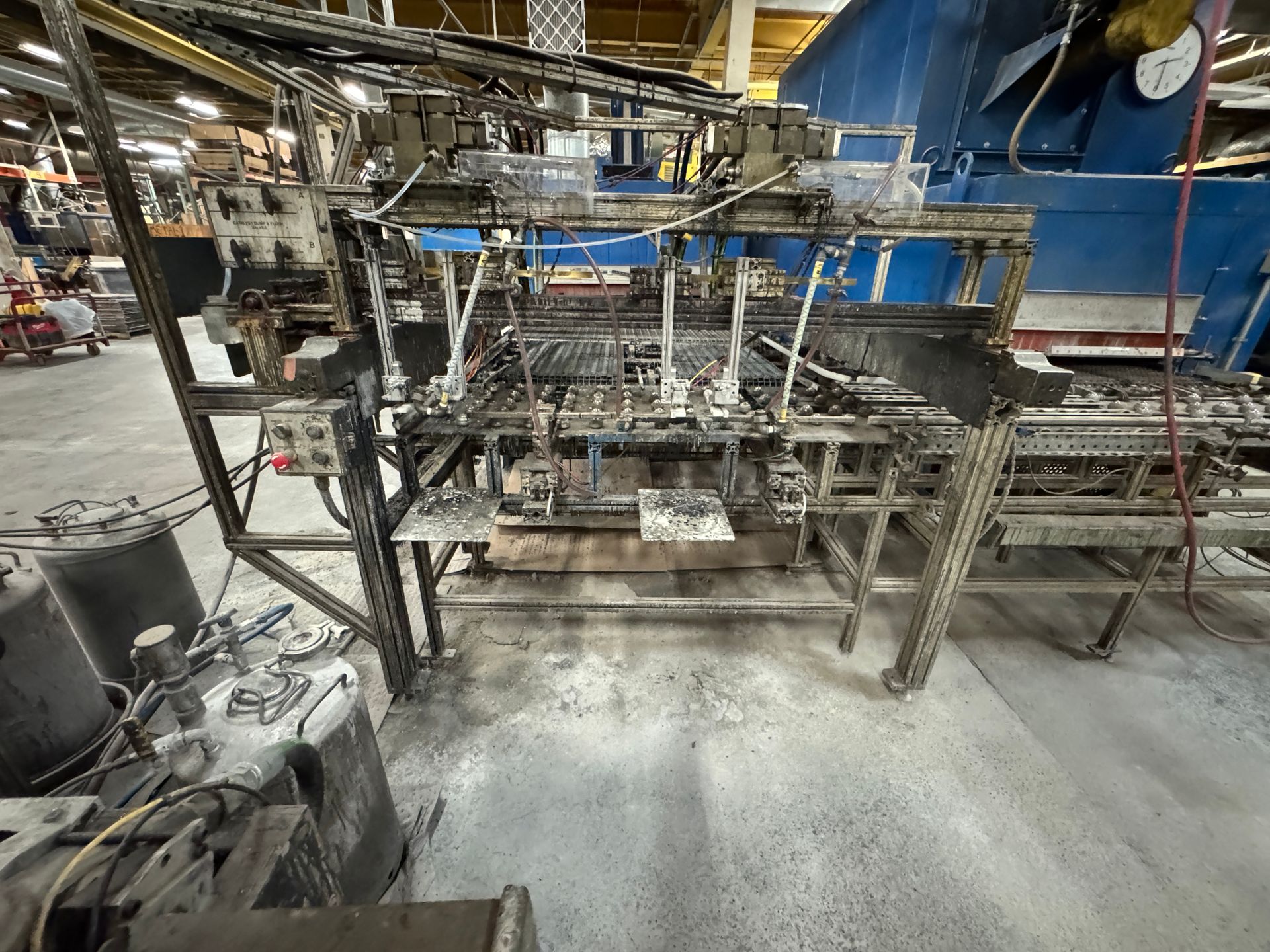 Industrial machinery with multiple levels, in a factory setting.