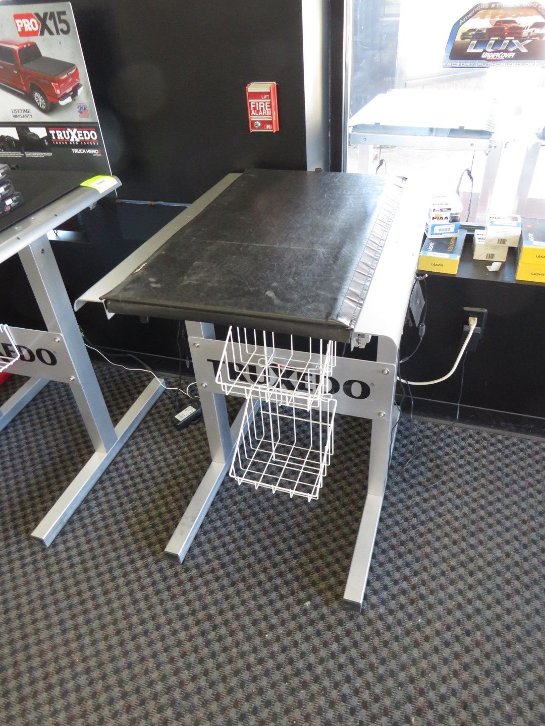 Silver and black truck bed cover.