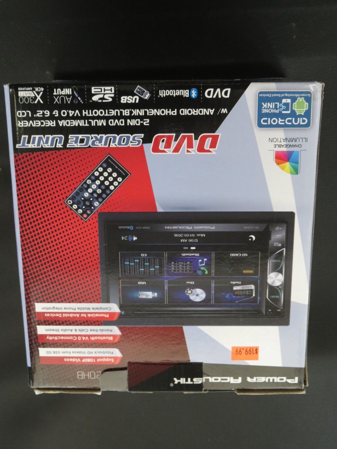Box for a DVD car stereo unit with remote control and features listed.