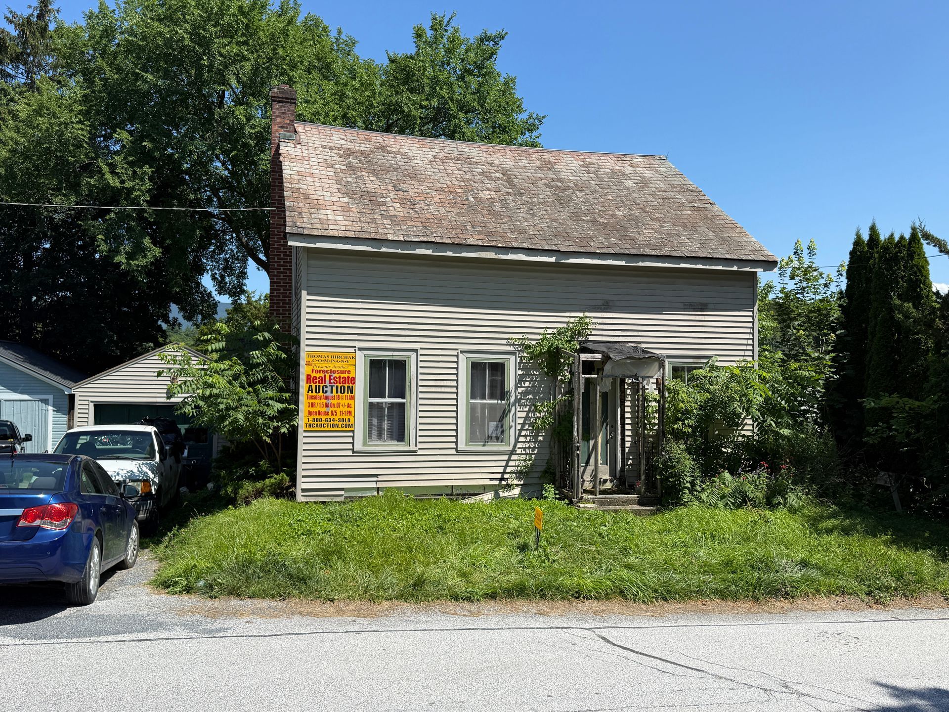 Small gray house with white trim