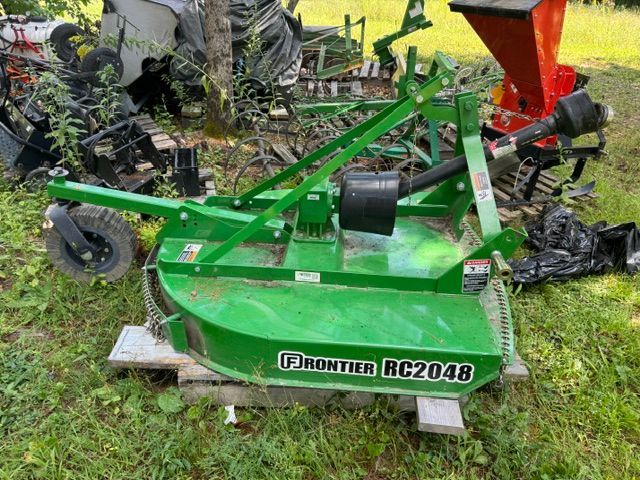 Green Frontier RC2048 mower attachment on grass 