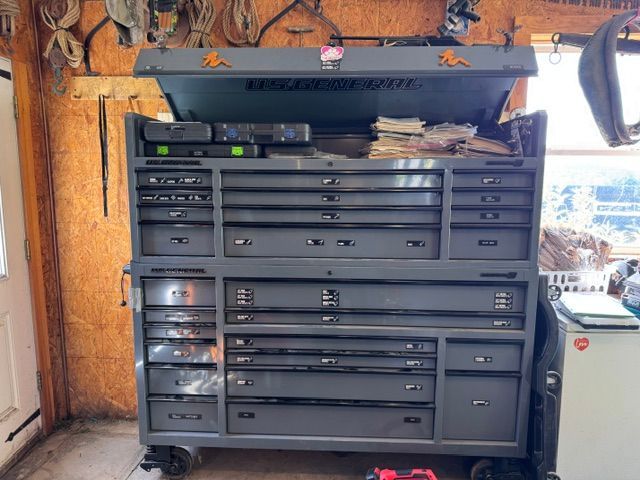 Black tool chest with many drawers