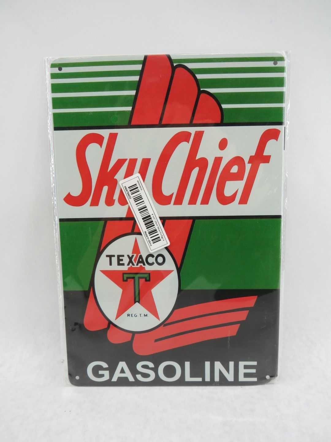 Sky Chief gasoline sign with red, white, green colors, and Texaco logo.