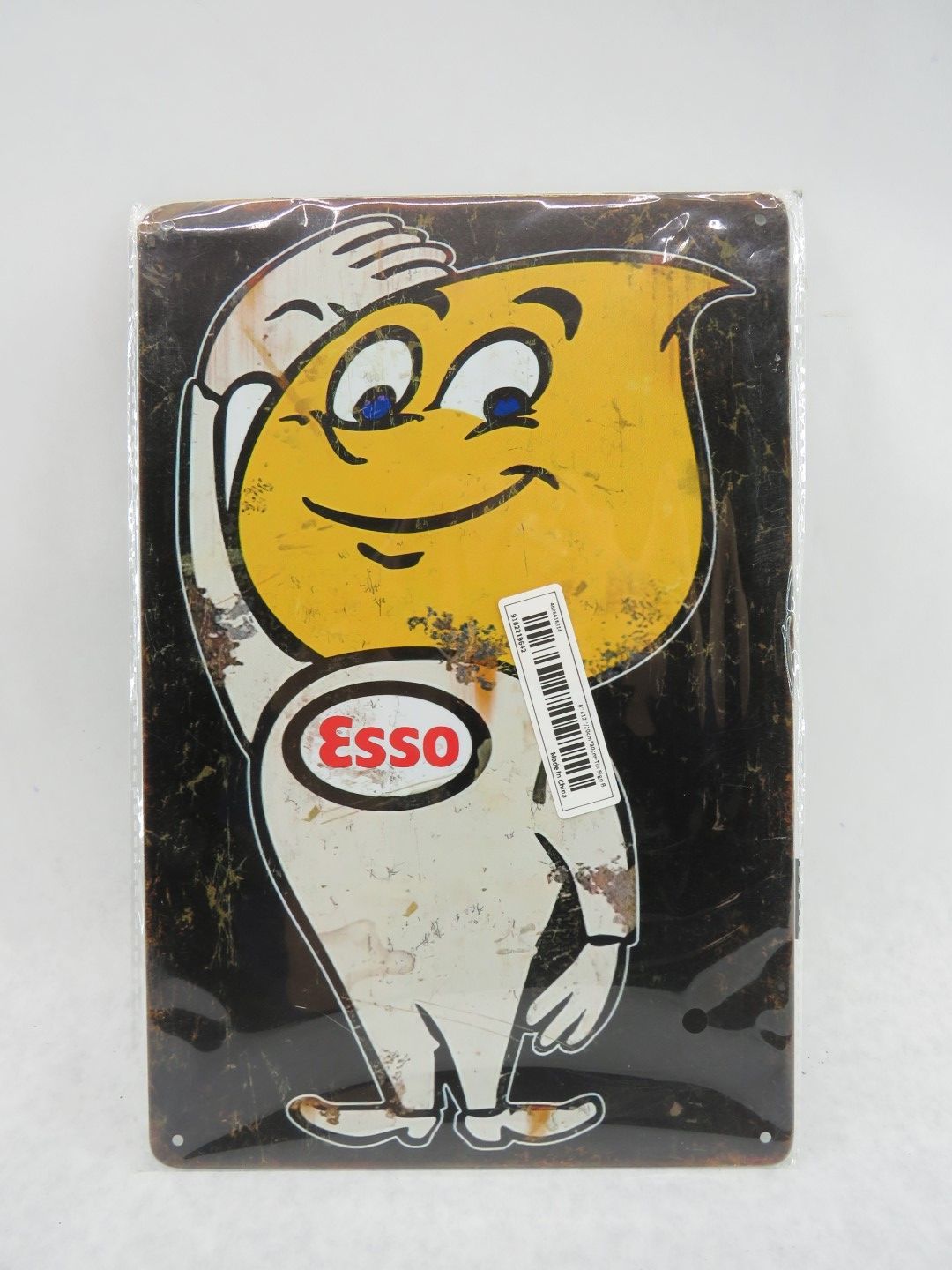 Vintage Esso gas sign with cartoon character 