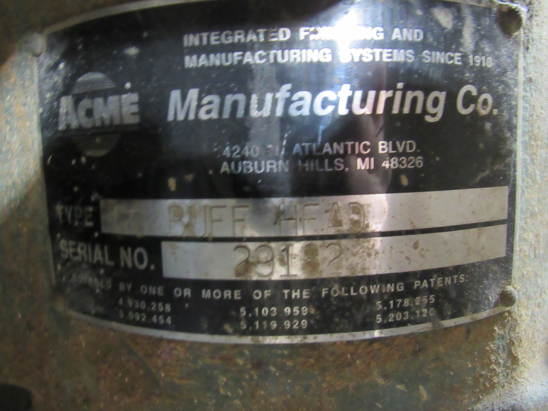 Nameplate of Acme Manufacturing Co. with type and serial number details.