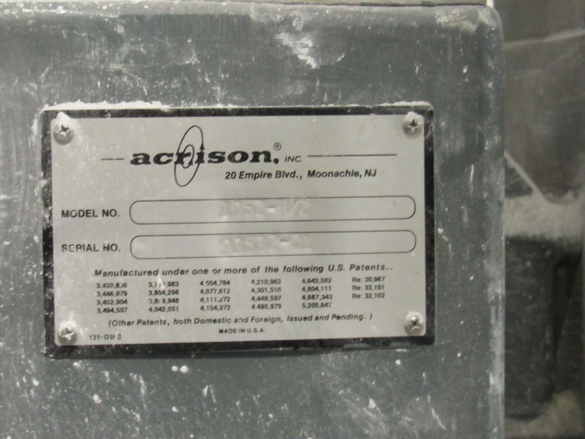 Silver Acrison, Inc. model and serial number plate on industrial equipment; Monmahle, NJ address.
