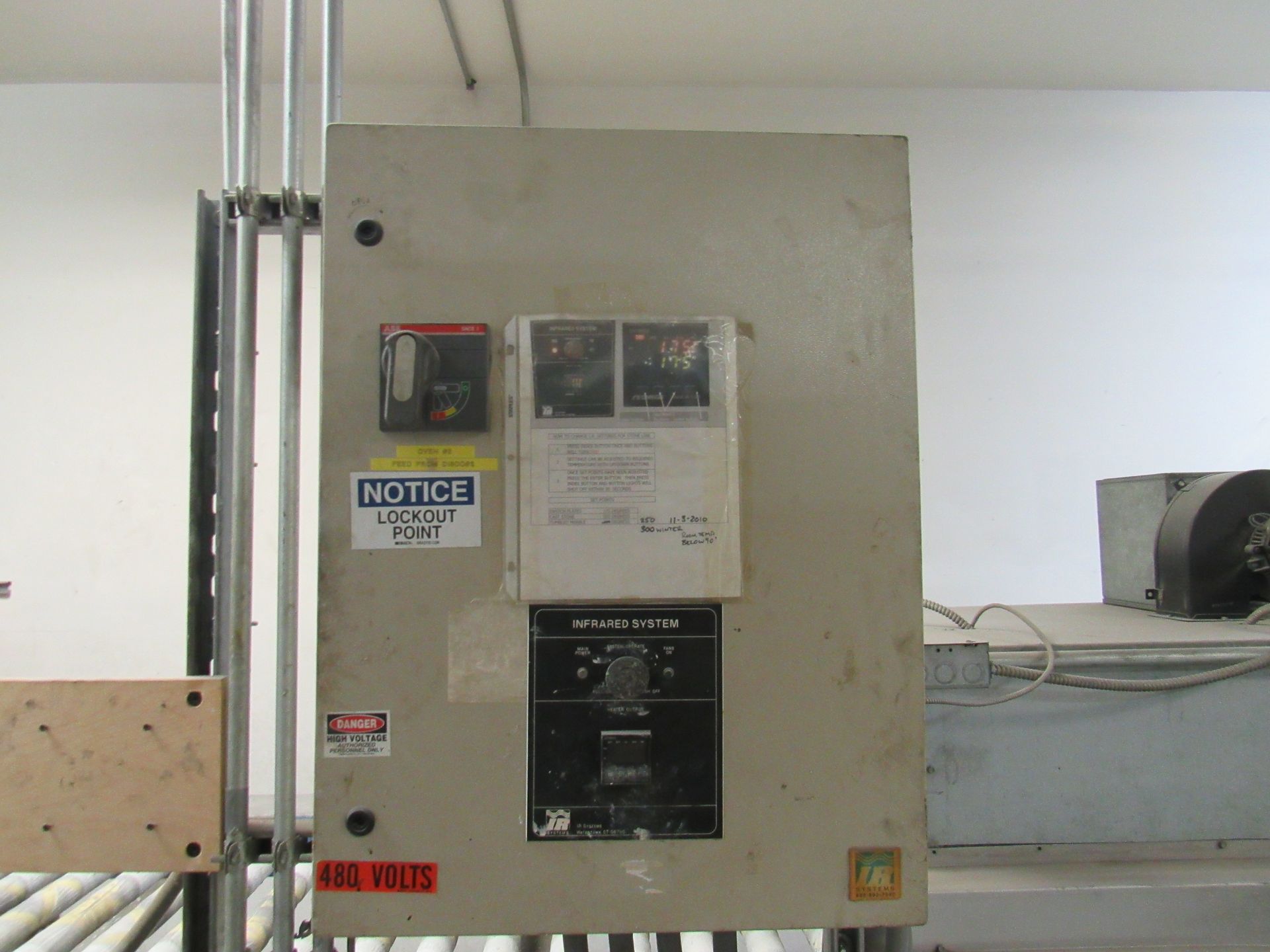 Electrical panel with safety labels.