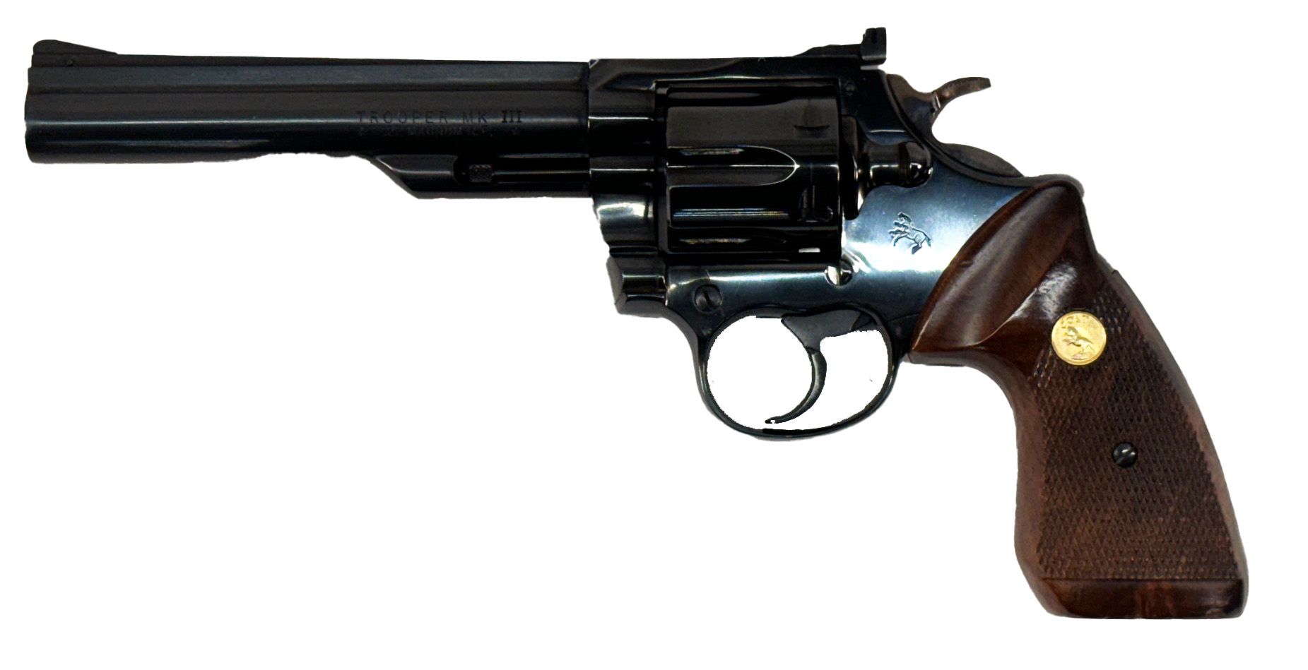 A dark, shiny revolver with a brown grip.