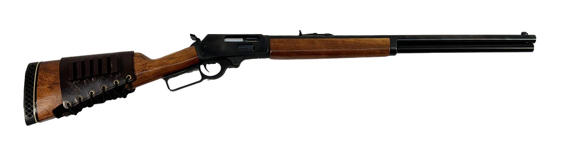 A lever-action rifle with a wooden stock and a dark metal barrel.