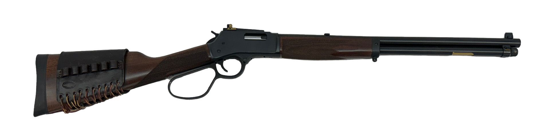 Lever-action rifle, brown wood, black barrel, mounted ammo pouch on stock, white background.