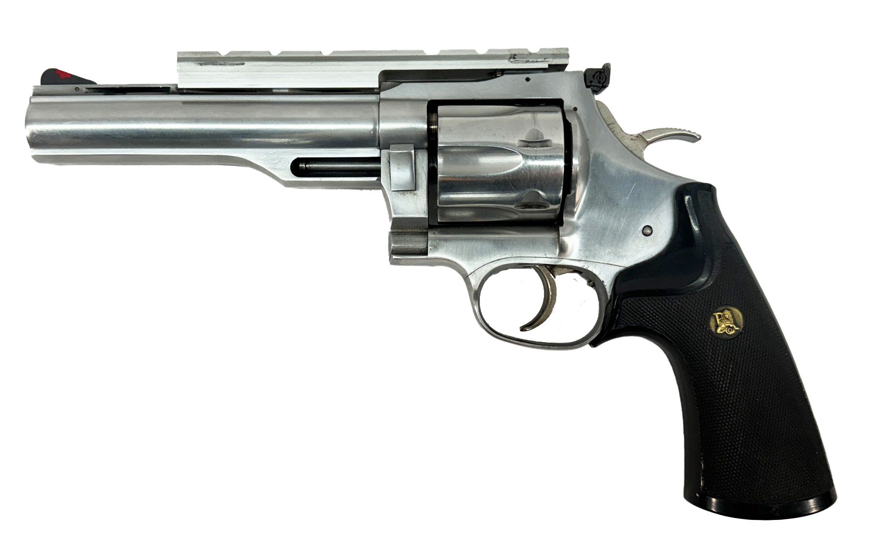 Silver revolver with a black grip.