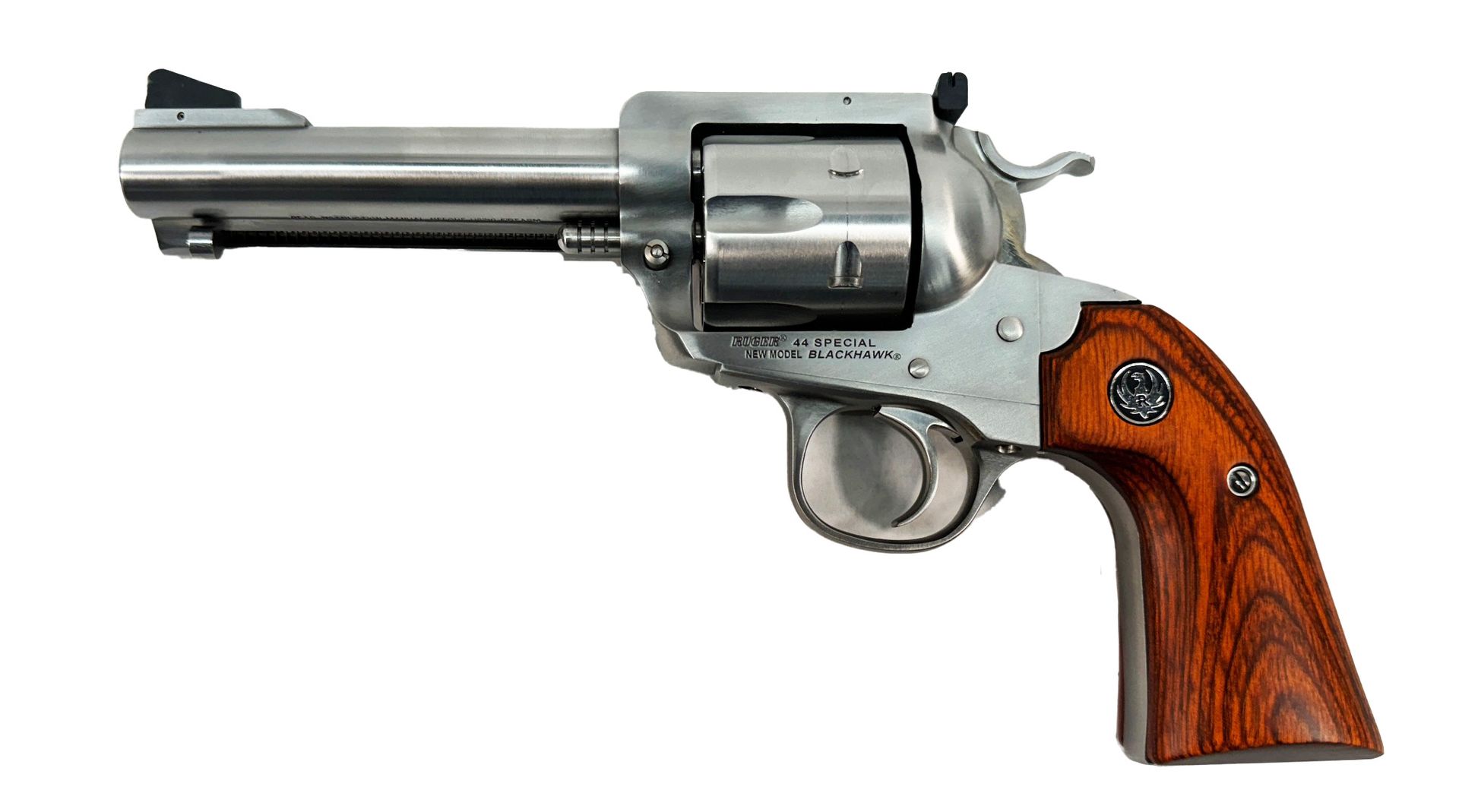 Stainless steel revolver with wood grip.