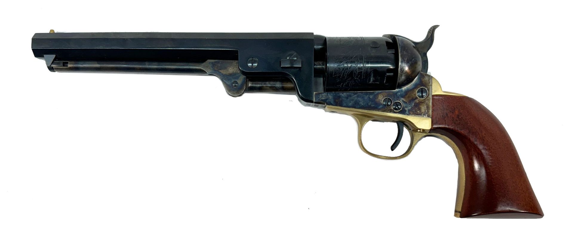 Black antique revolver with wooden handle on white background.
