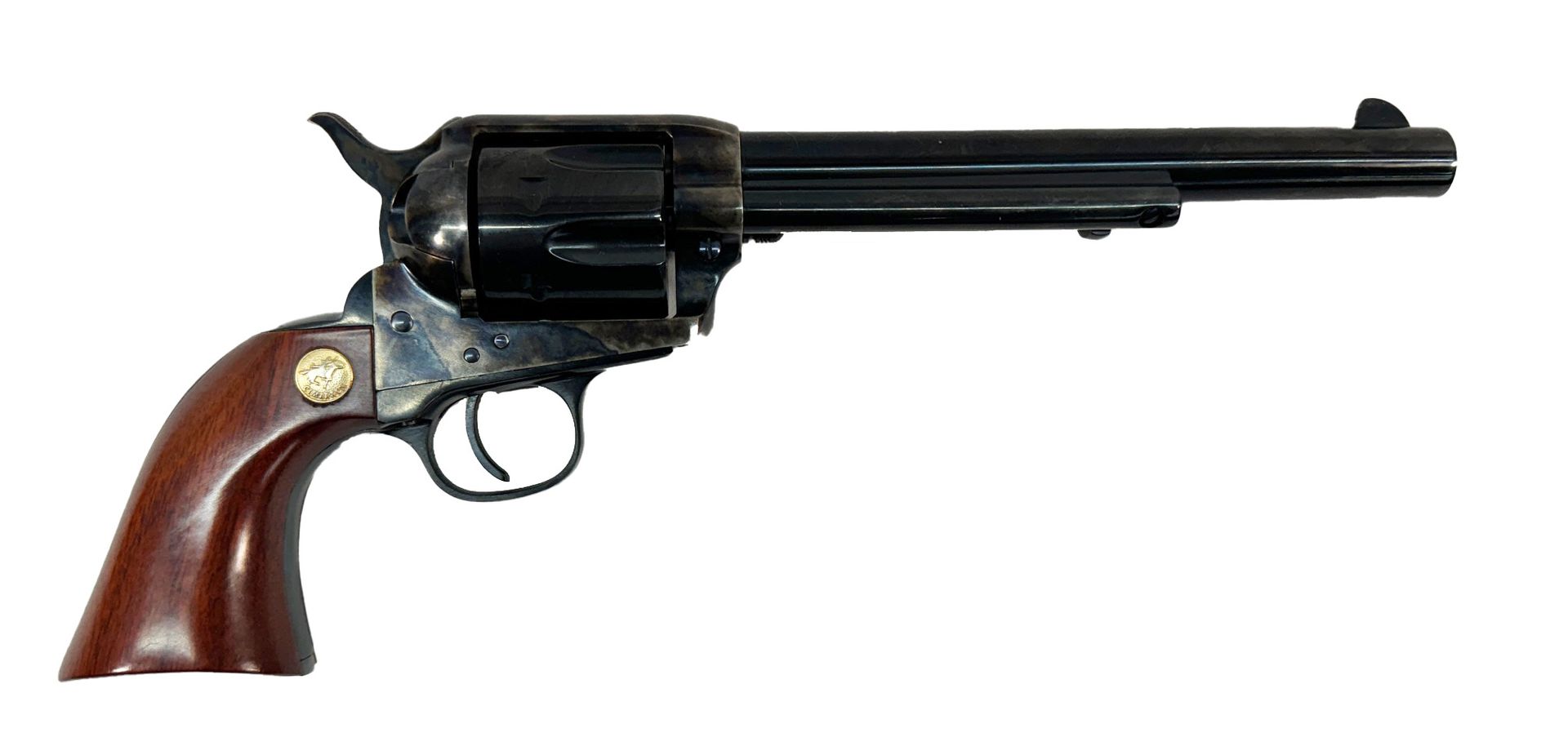 A black revolver with a wooden handle on a white background.
