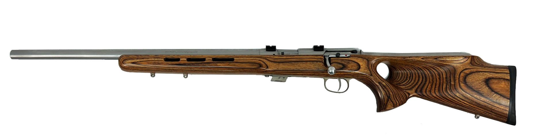 A rifle with a wooden stock, stainless steel barrel, and a bolt-action mechanism.