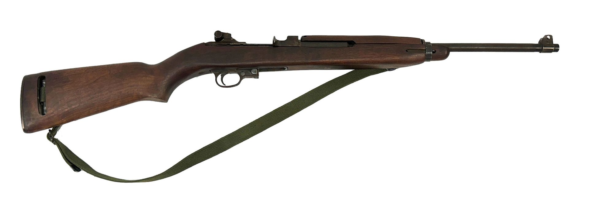 A brown M1 Carbine rifle with a green strap on a white background.