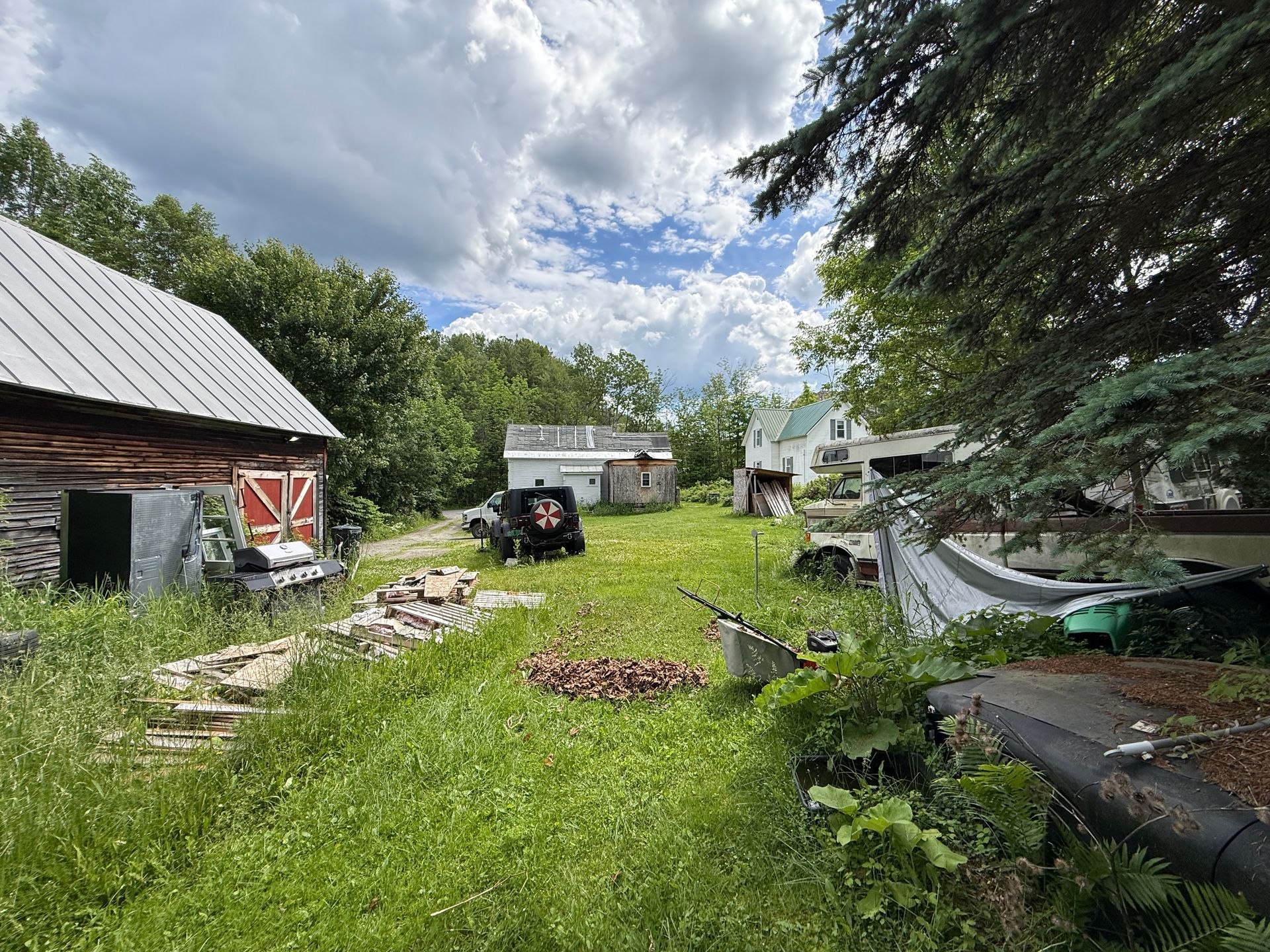 Rural yard with barn, tractor