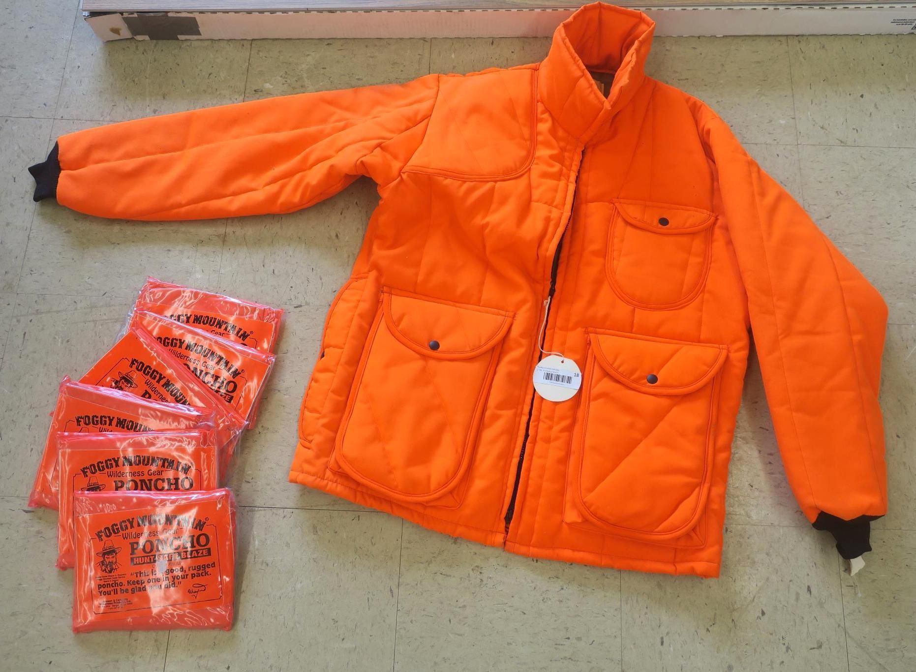 Orange winter coat laid flat
