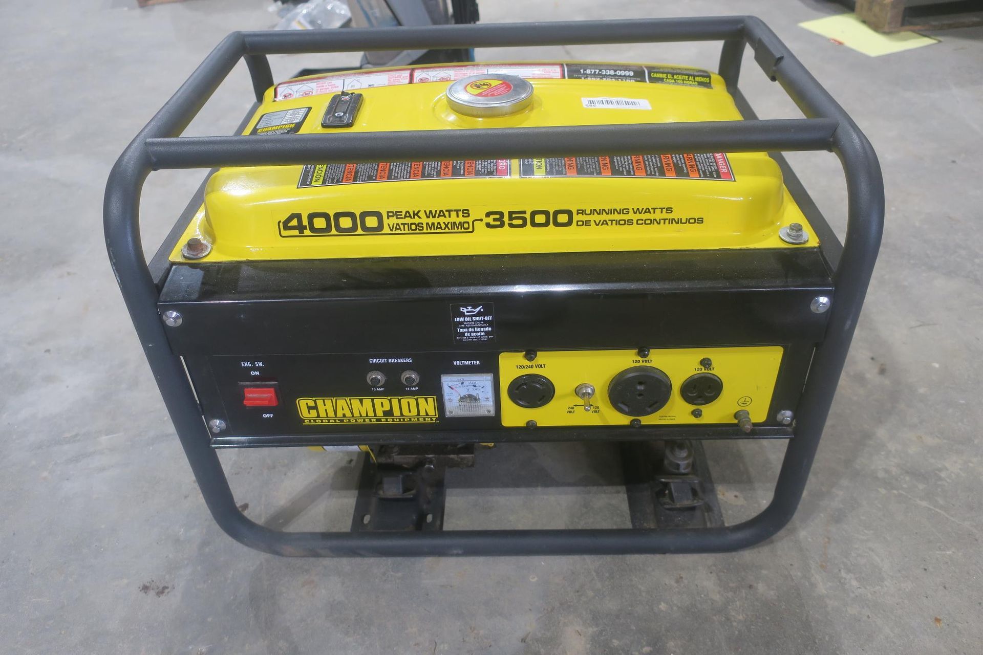 Yellow portable generator in a black metal frame
