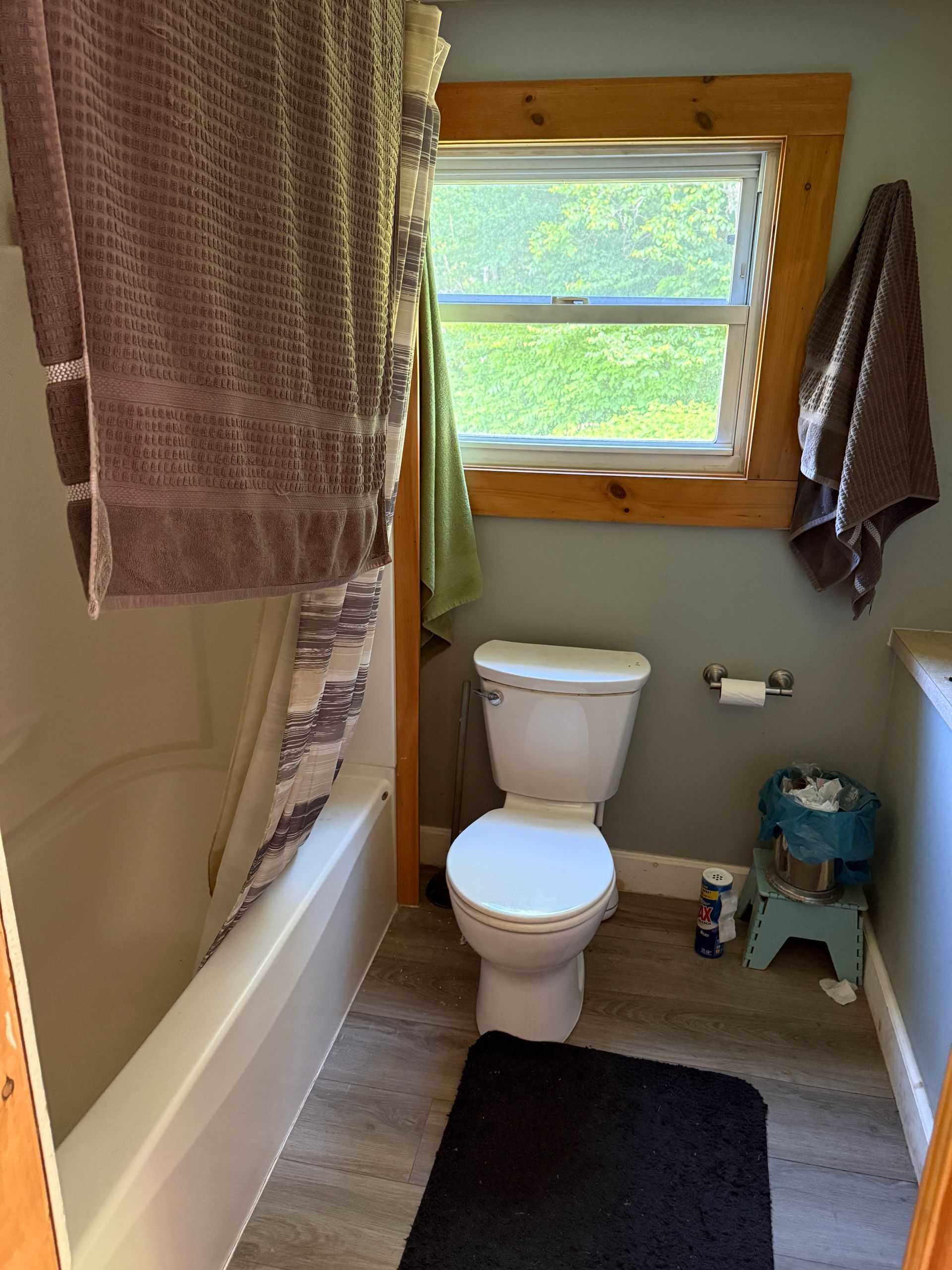 Small bathroom with toilet, window