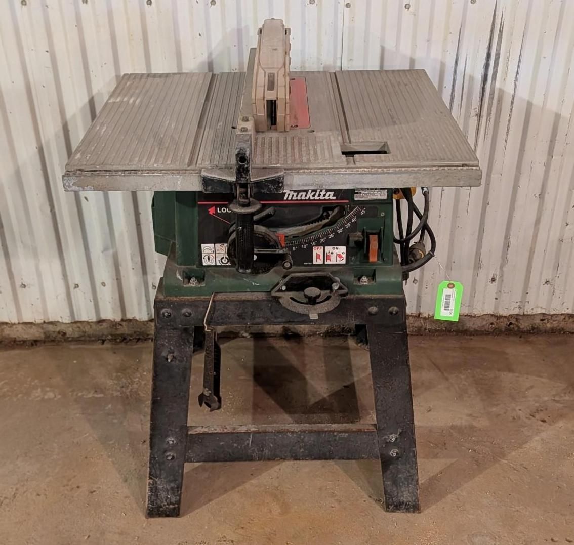 Table saw on a metal stand in a workshop