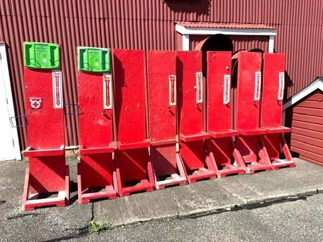 Row of red metal stands