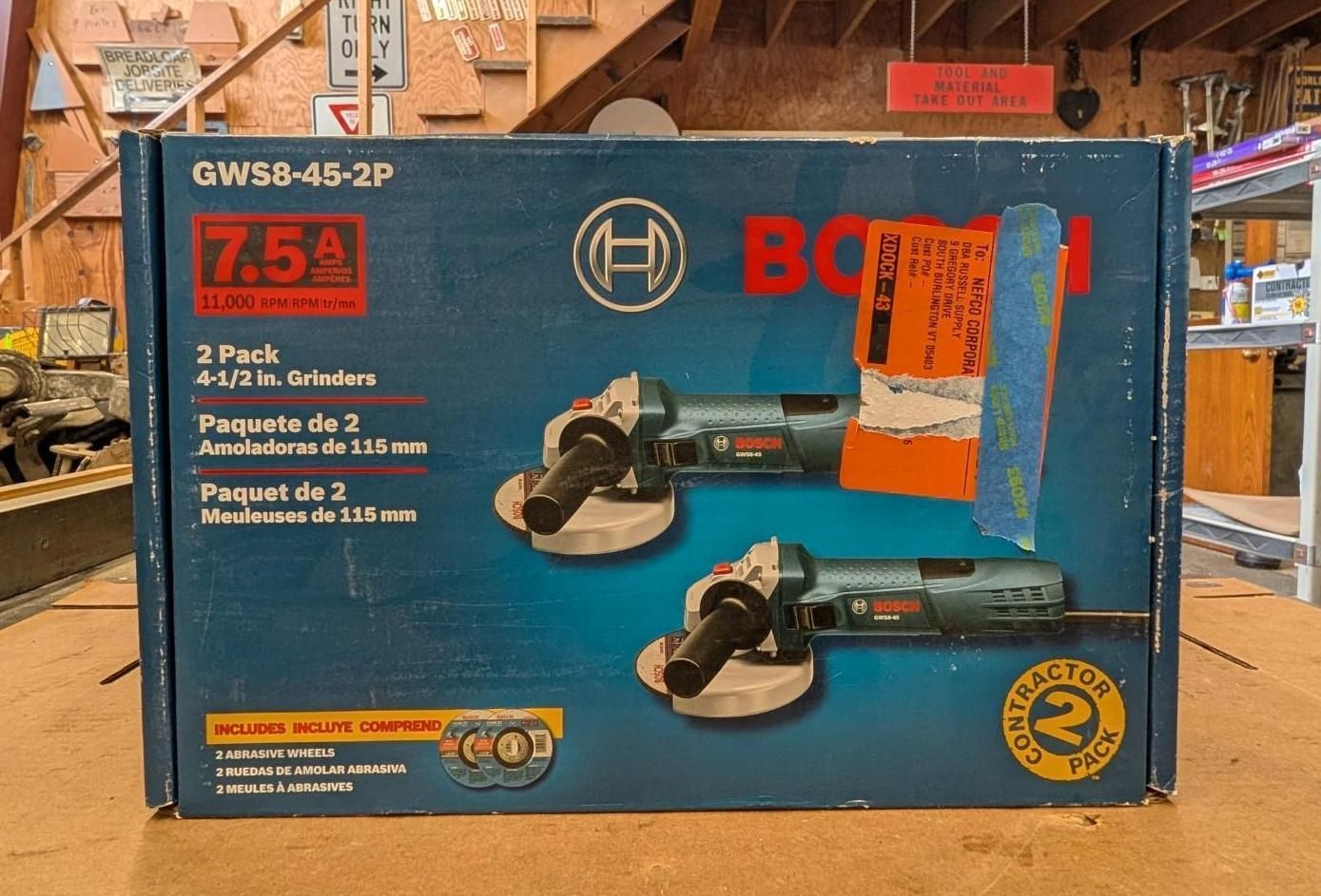 Bosch 7.5A angle grinder kit in blue box on store shelf