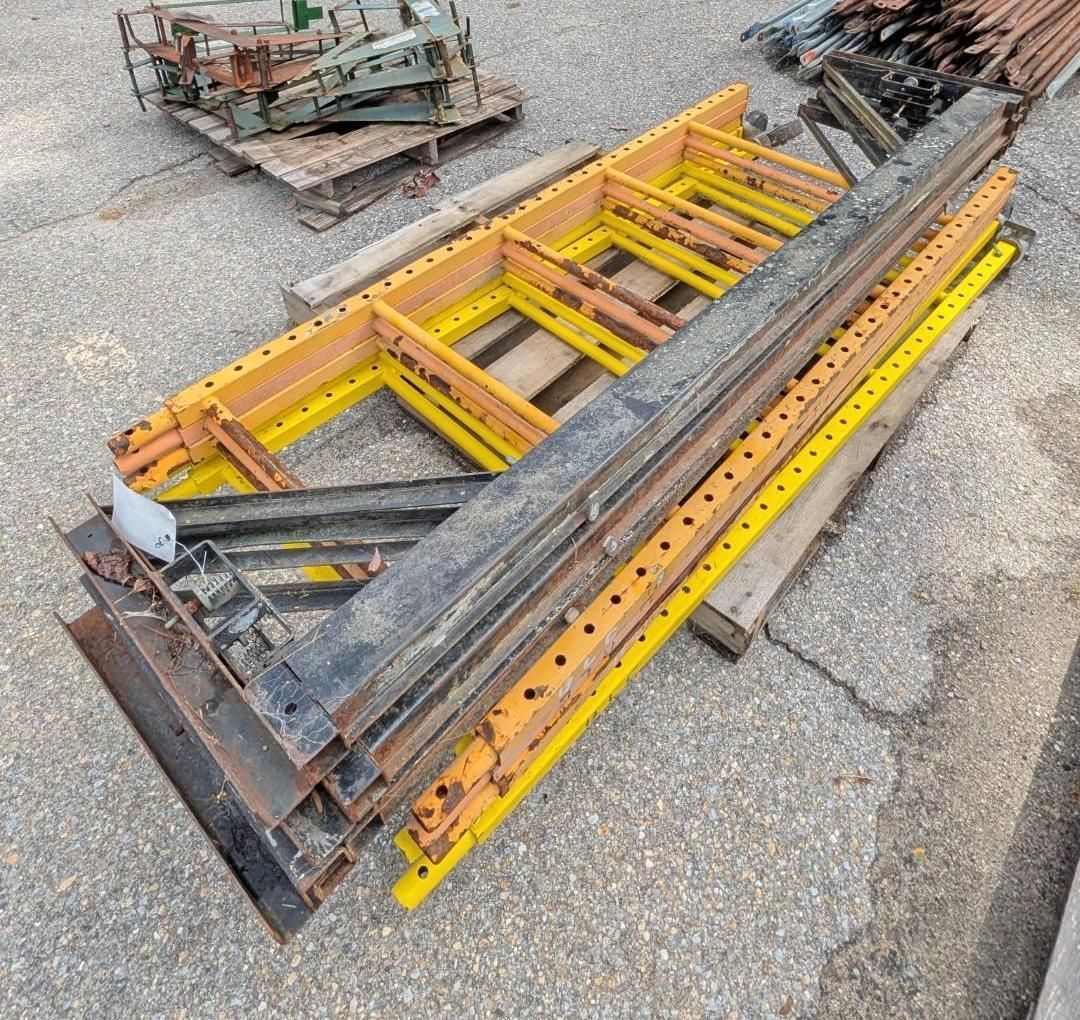 Stacked yellow and black metal construction forms