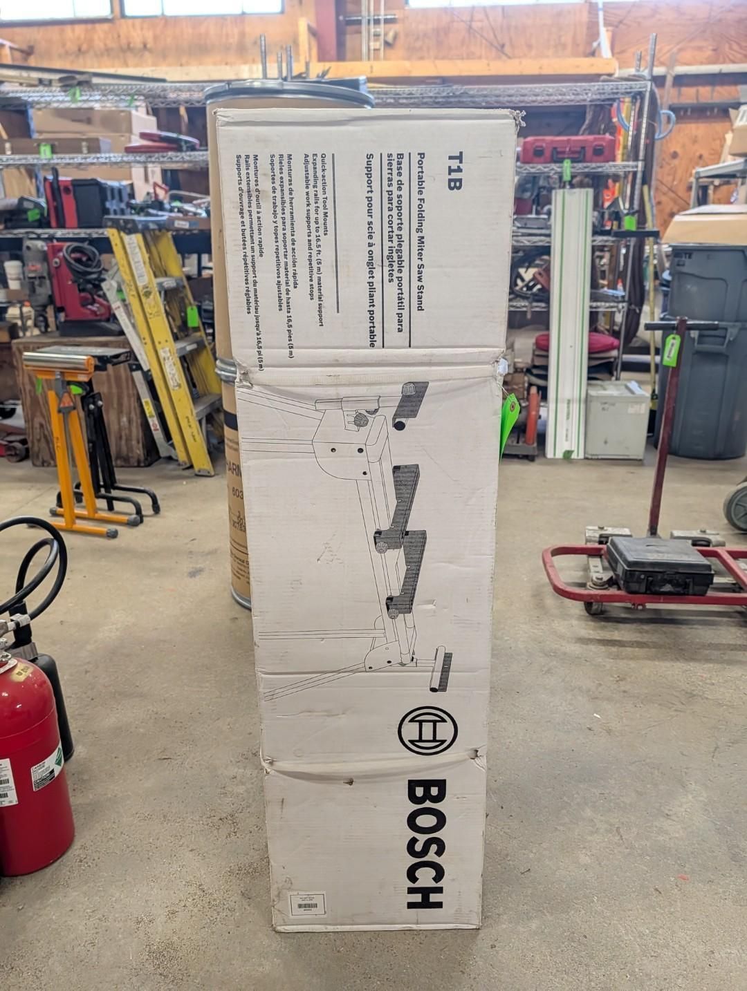 Bosch box standing upright in a hardware store aisle, with shelves and equipment in the background