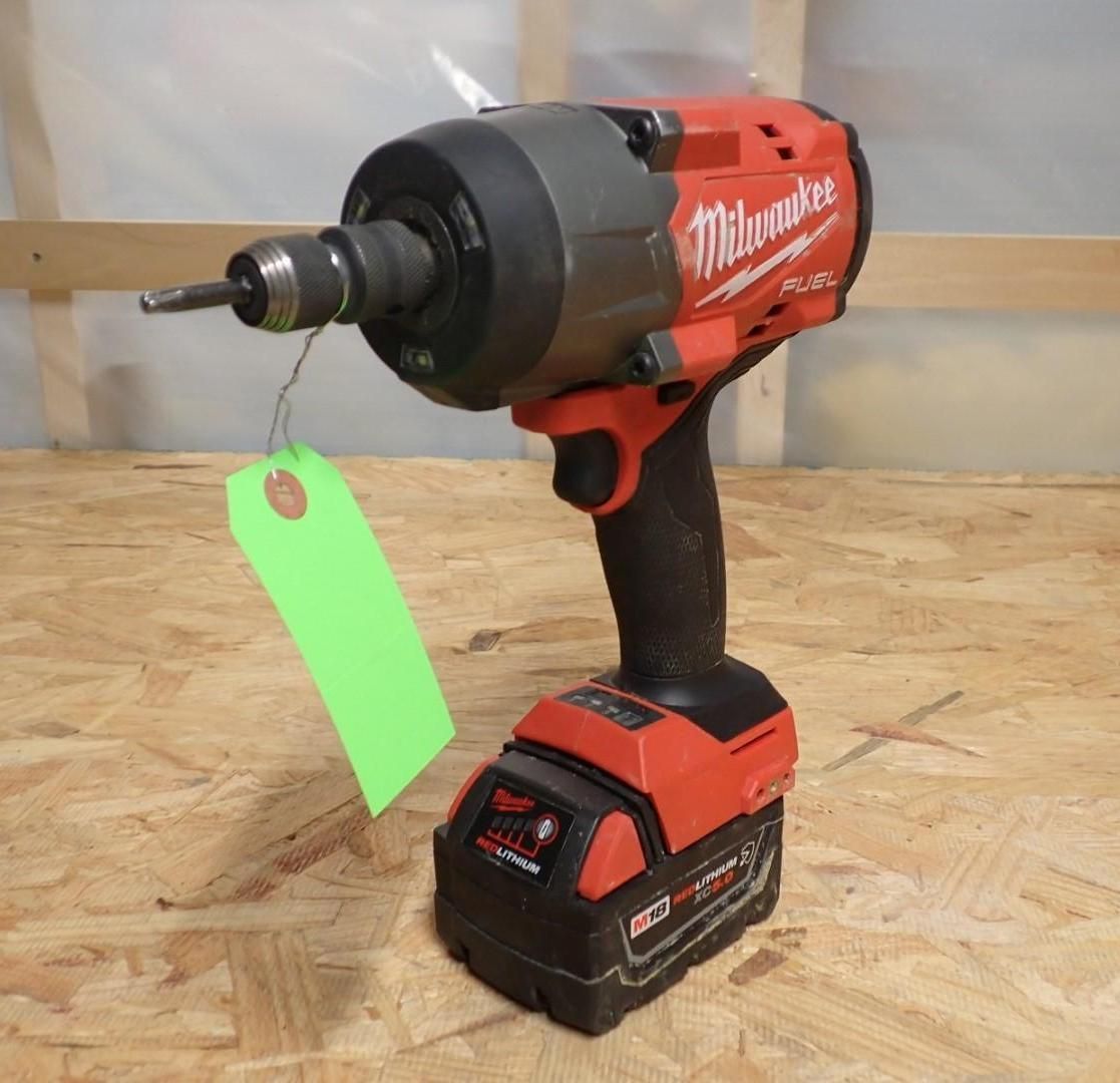 Red Milwaukee cordless drill