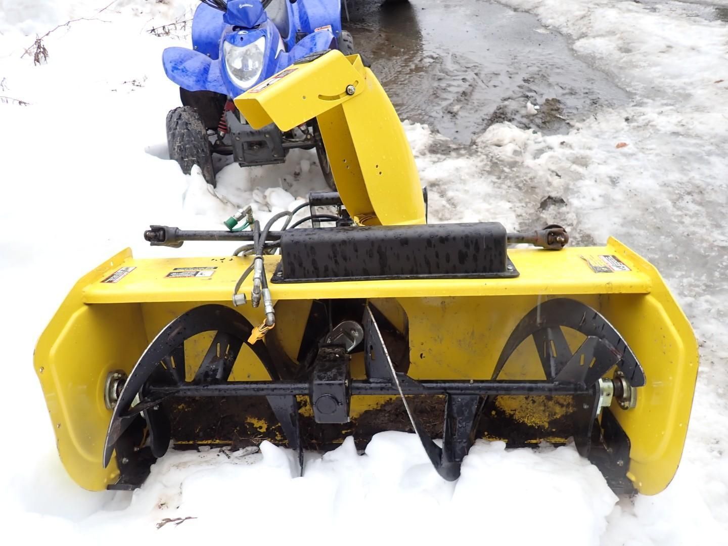 Yellow snow blower