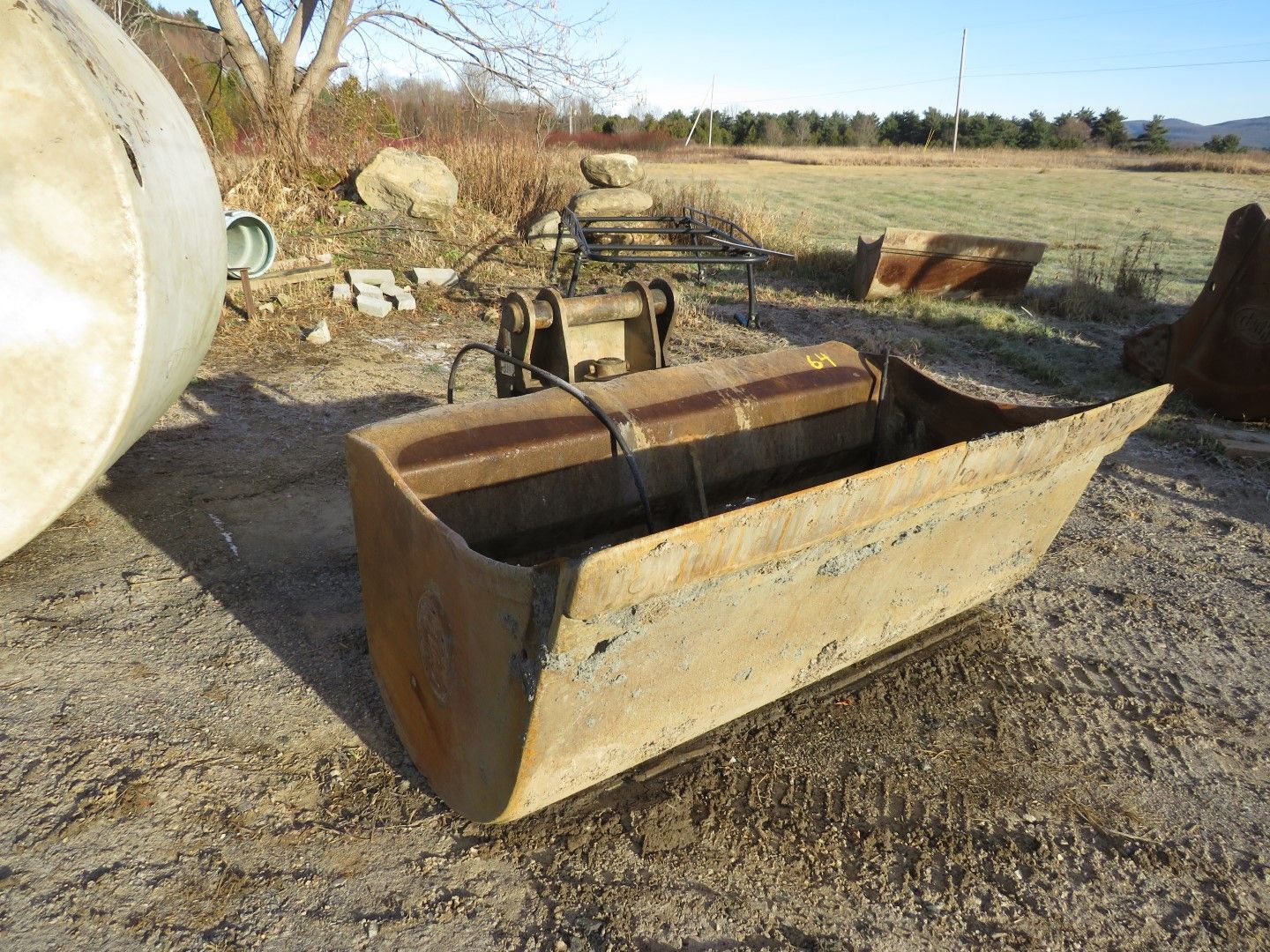 metal bucket attached to an excavator