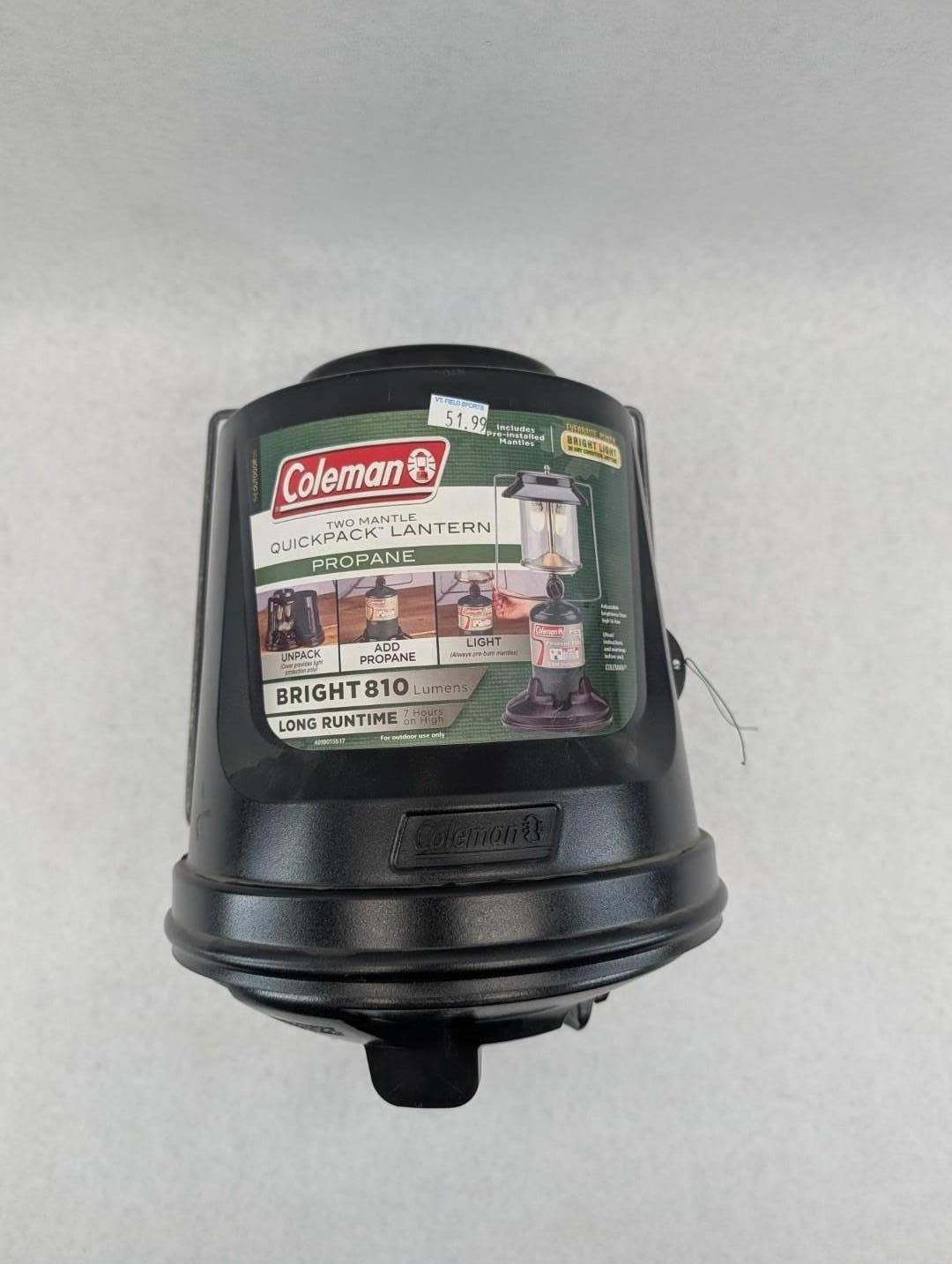 Black Coleman water jug with a label, shown against a plain background.