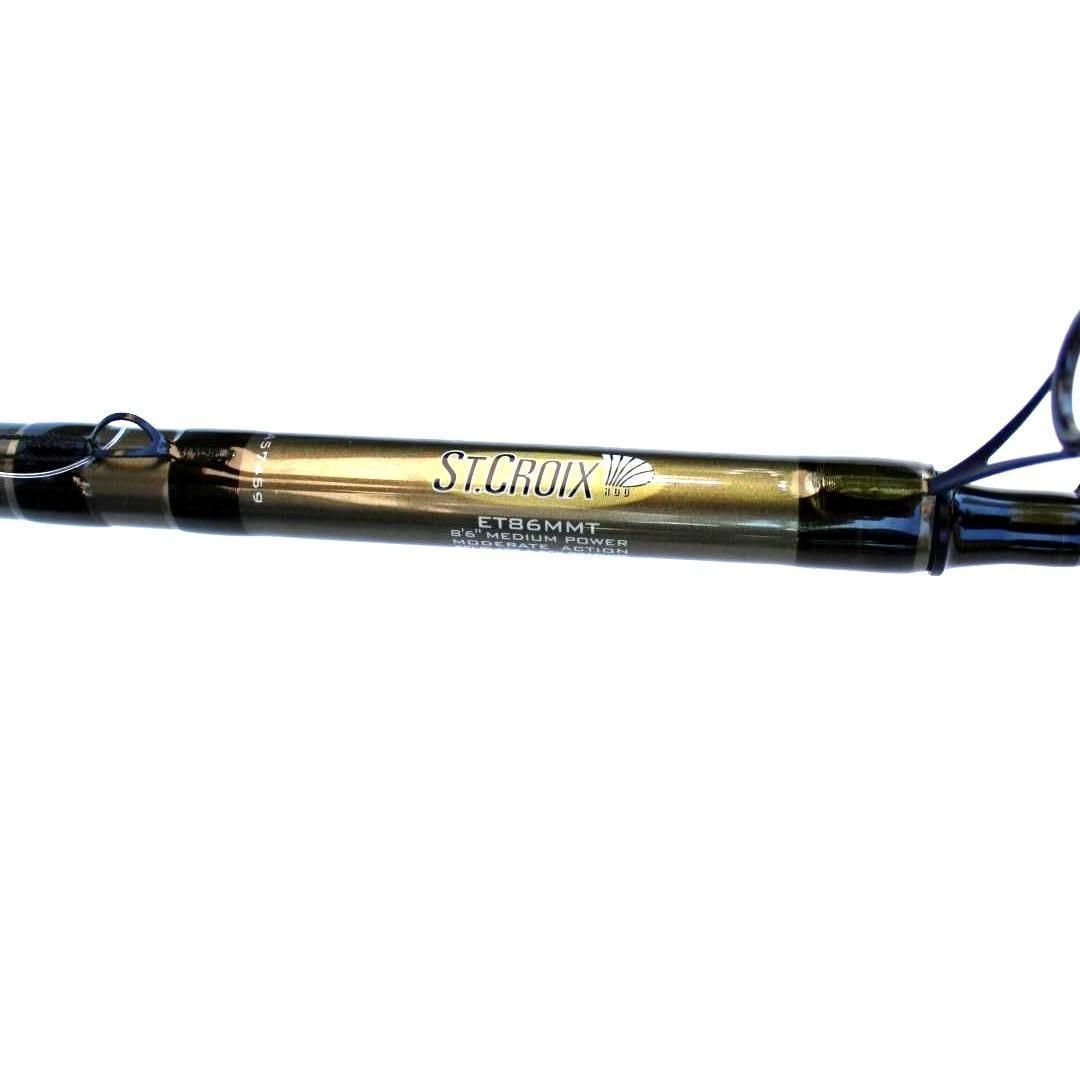 Close-up of a gold and black fishing rod