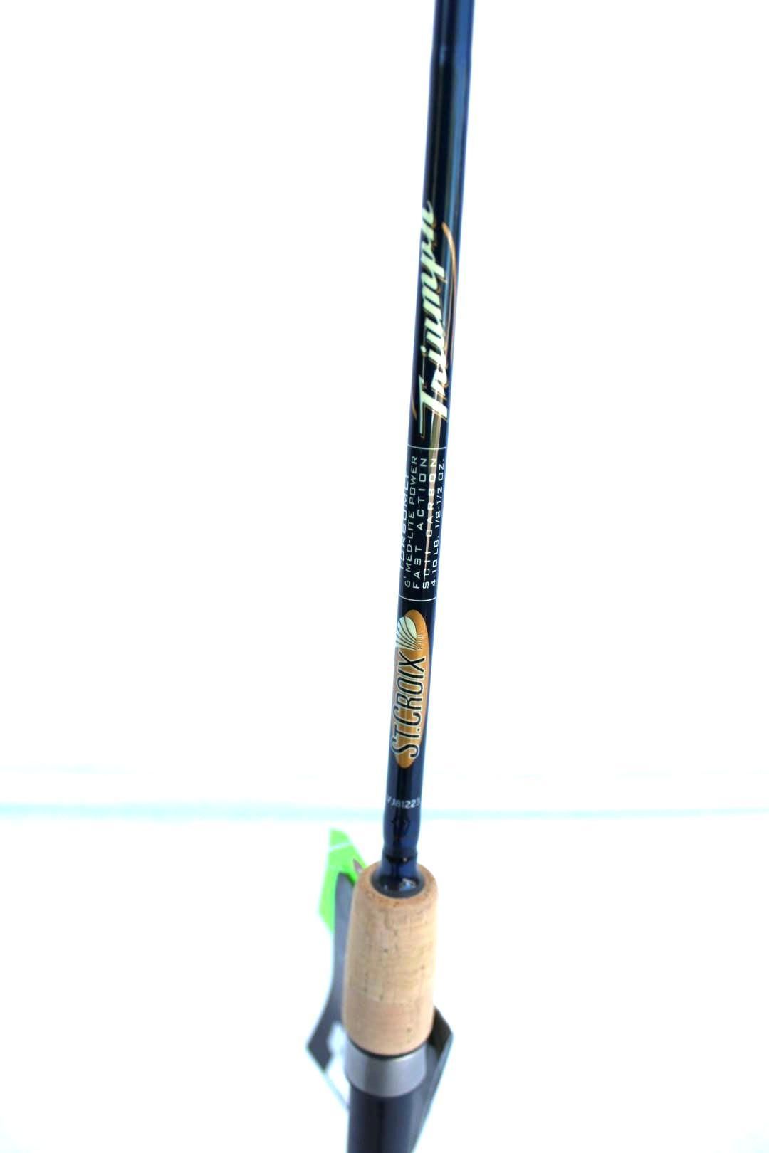 Vertical fishing rod with a blue shaft and cork handle against a plain white background