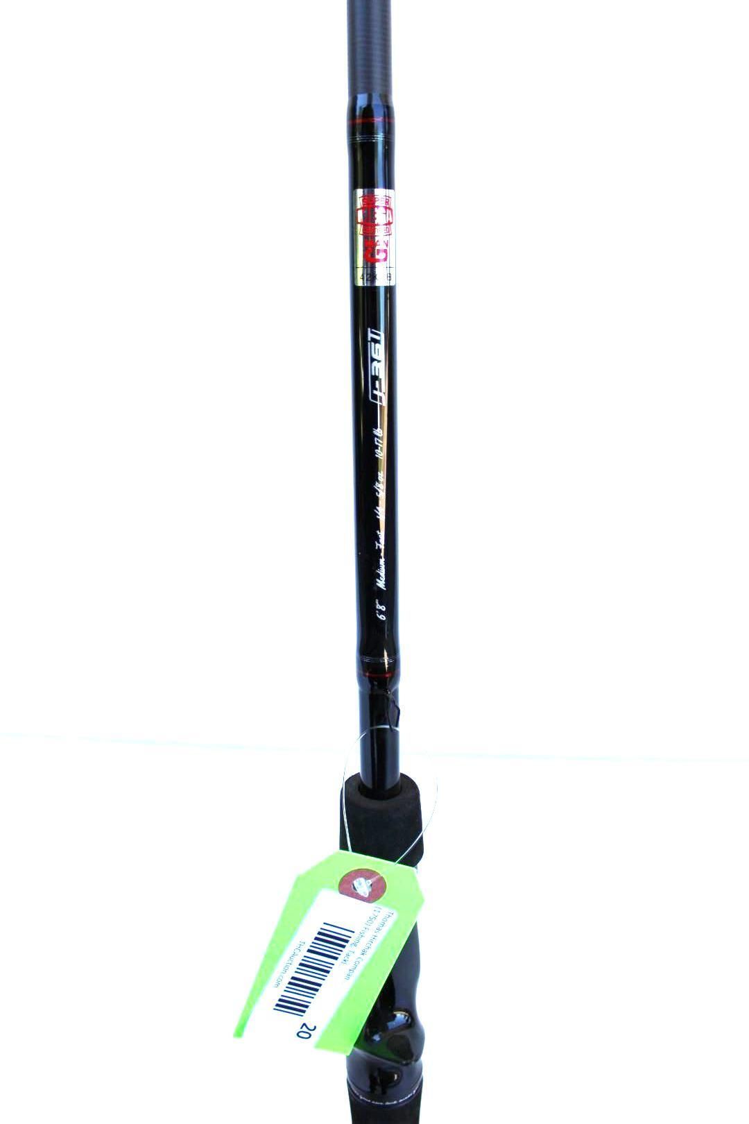 Black fishing rod with a green hanging tag on a white background