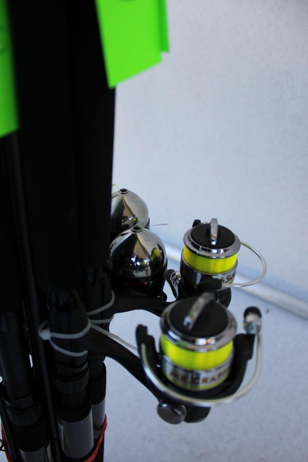 Black fishing rods with reels