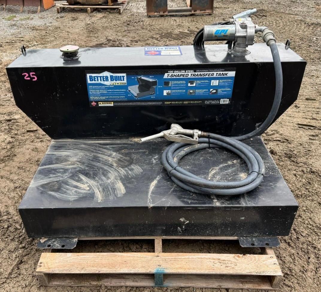Black utility tank on a wooden pallet with a coiled hose and pump assembly outdoors