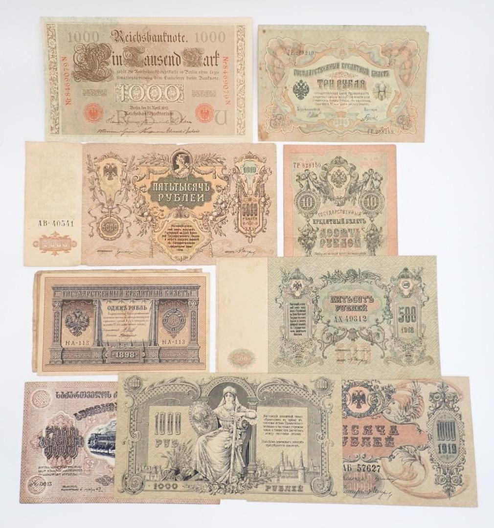 Assorted vintage banknotes and paper currency arranged in a collage on a white background